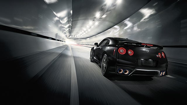 2023 Nissan GT-R seen from behind driving through a tunnel | Neil Huffman Nissan of Frankfort in Frankfort KY